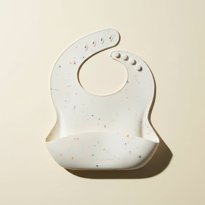 Silicone Bib Printed: Confetti Cream